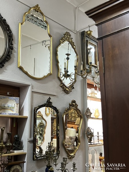 Ornate metal framed baroque style wall mirror