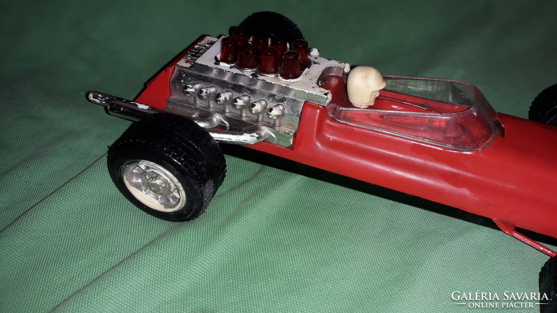 Old vinyl - metal sheet bottom flywheel shape - 1 toy car 28 cm tall as shown in the pictures