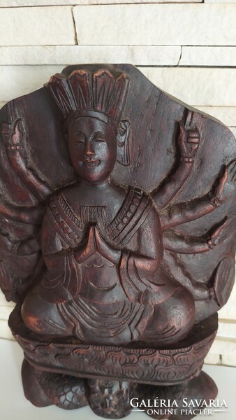Buddha, old carved wooden statue