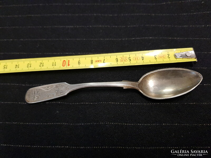 Engraved silver teaspoon