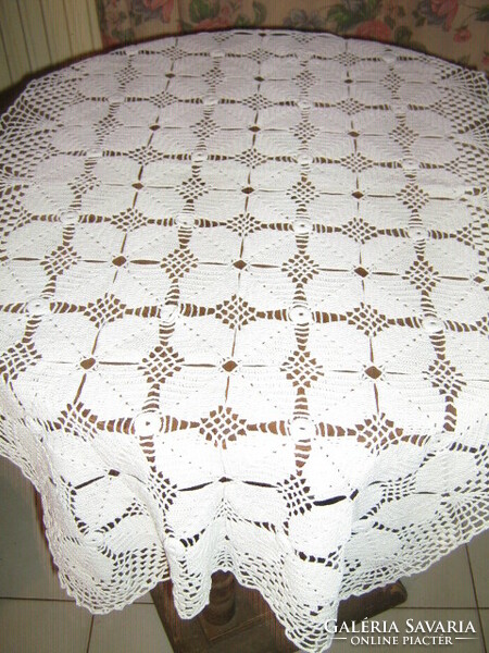 Beautiful special white hand crocheted antique lace tablecloth with flower pattern