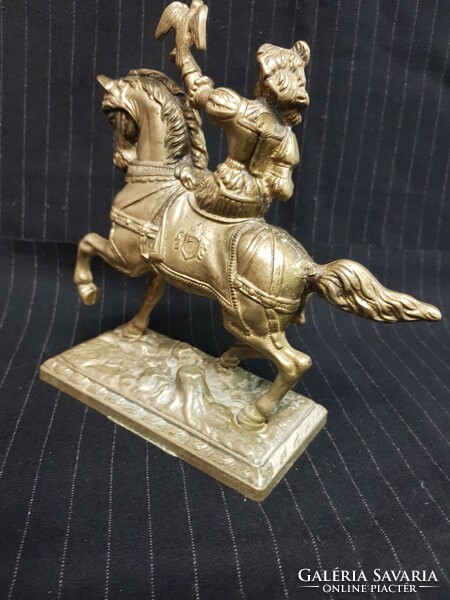 Old copper equestrian statue.