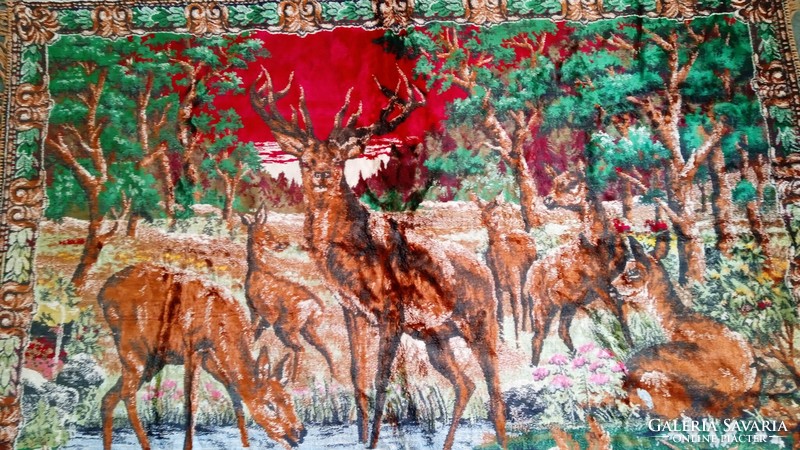 Old silk carpet/wall protector with a deer scene