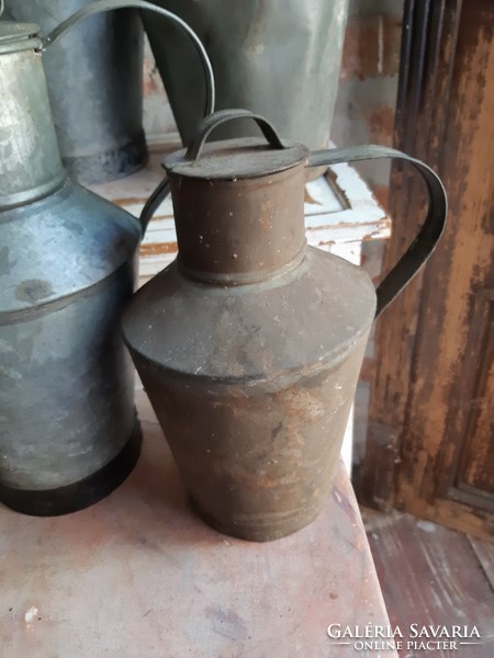 Small tin and metal buckets are less common