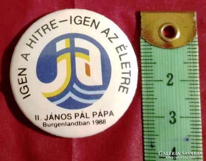 A badge issued to commemorate a papal visit is for sale in 1968