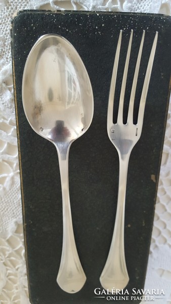 Christofle silver-plated children's spoon and fork, in a decorative box