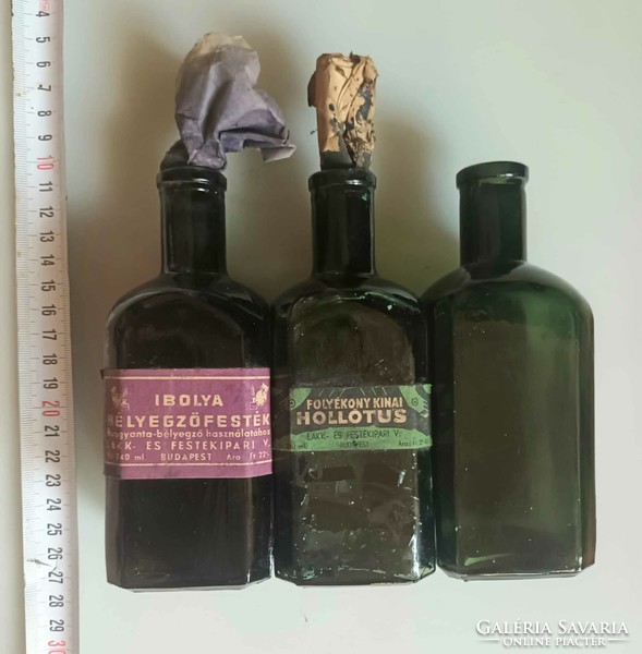 Antique bottles with ink labels