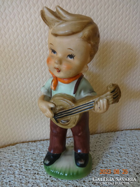 Old Erich Stauffer porcelain figure: boy playing the banjo