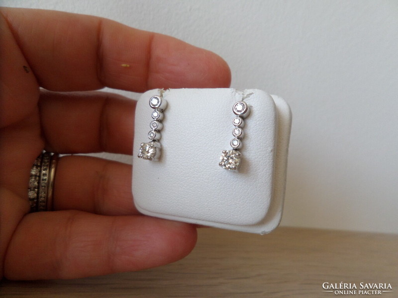A pair of 18K white gold modern earrings