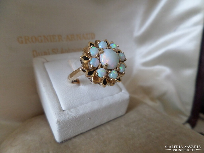 Gold cocktail ring with genuine opals and black enamel