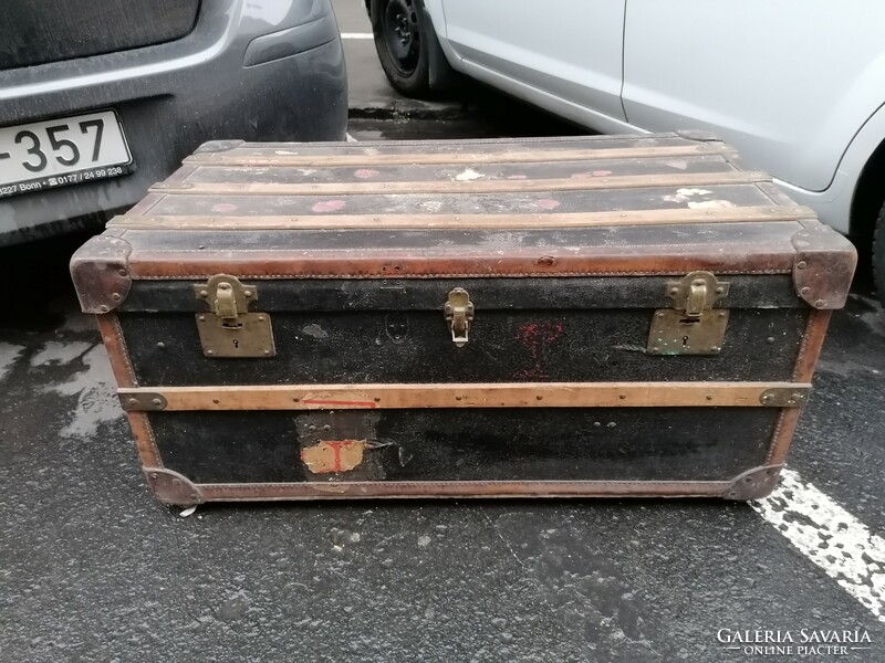 Old large traveling chest with a copper lock, in good condition
