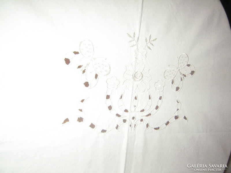 Beautiful bone-colored flower and butterfly patterned tablecloth