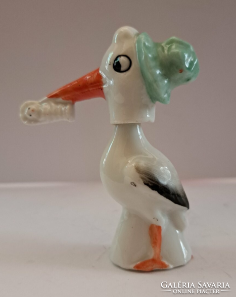 Porcelain figurine of a stork with a nodding head