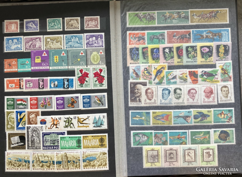 Mélyzöld, szép állapotban lévő bélyegalbum magyar postatiszta bélyegekkel