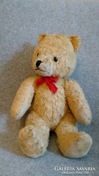 A solidly built, non-sponge, sounding teddy bear from the 1960s