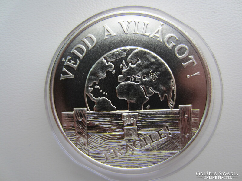 1994 Protect the world 1000 ft bu silver coin