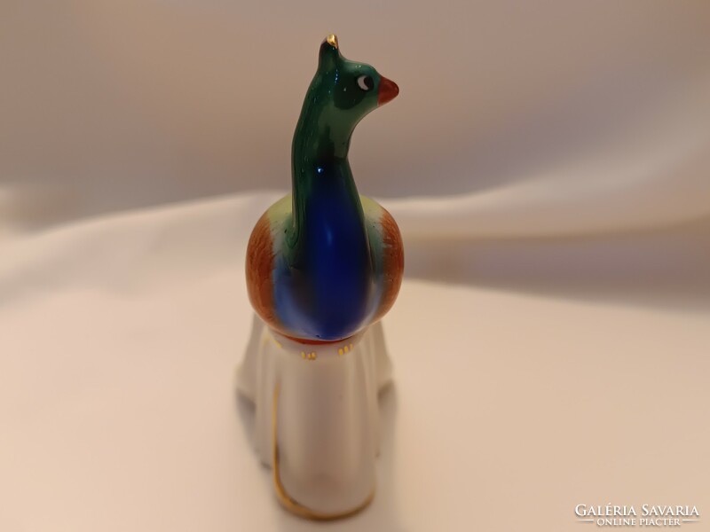Porcelain peacock figure