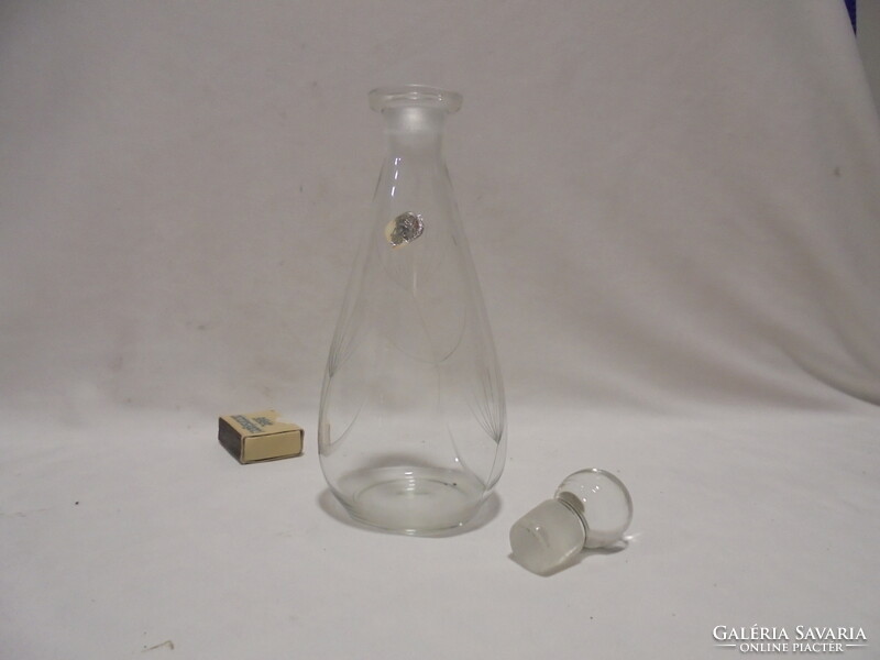 Old glass carafe, liqueur glass, pouring