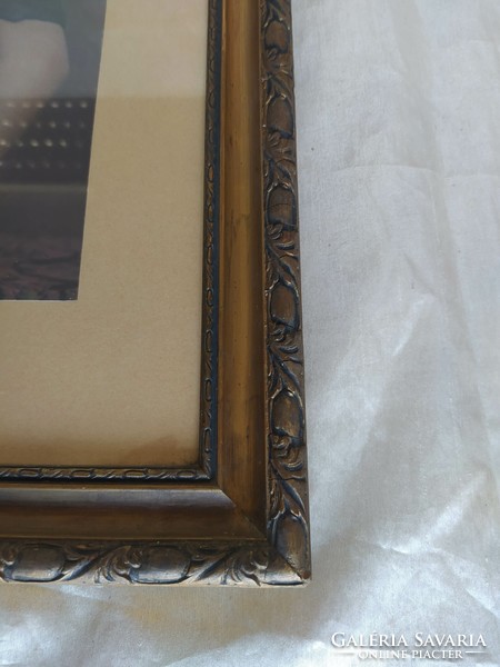 Antique picture frame with photo