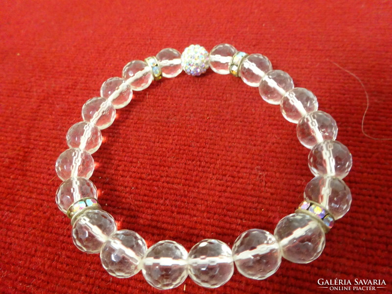 Bracelet made of white glass balls, rubber, with a decorative ball. Jokai.