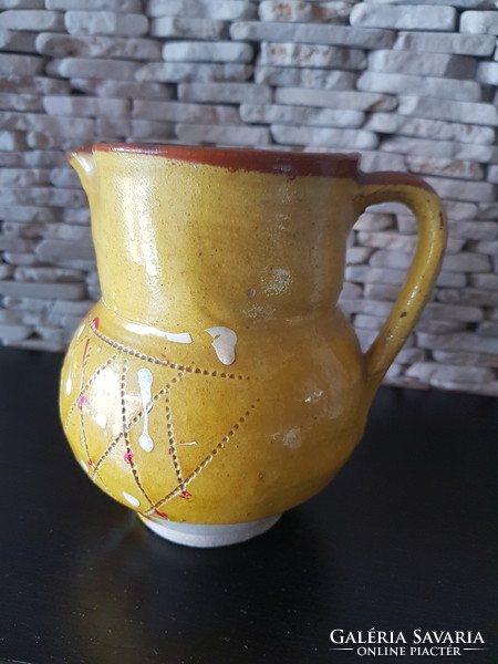 Old yellow glazed ceramic mug from Transylvania, from a collection