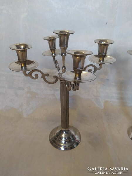Pair of antique metal candle holders