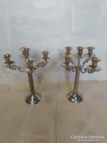 Pair of antique metal candle holders