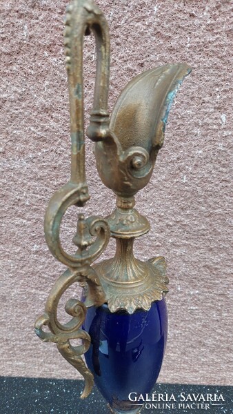 Antique decanter with gargoyle