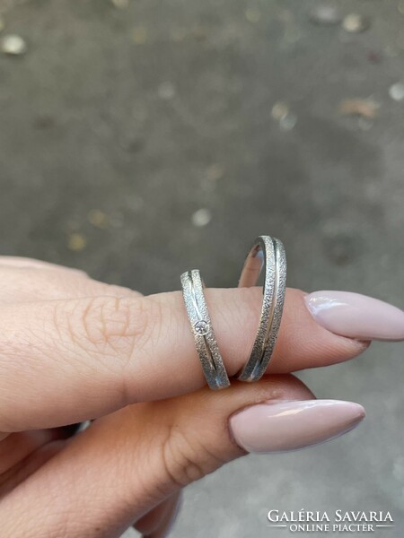 Pair of silver engagement rings