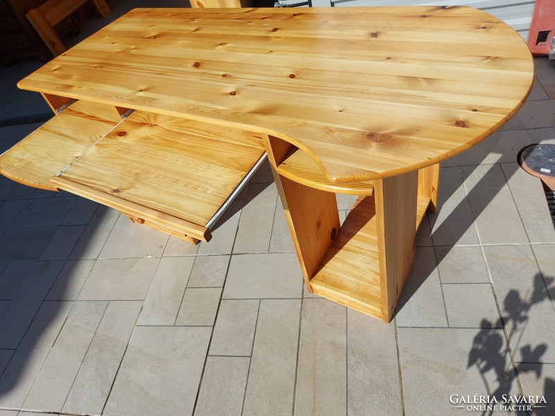 For sale is a pine desk with 4 drawers and 2 pull-out shelves.