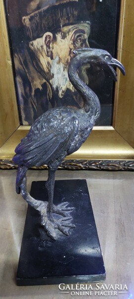 Antique heron bird sculpture
