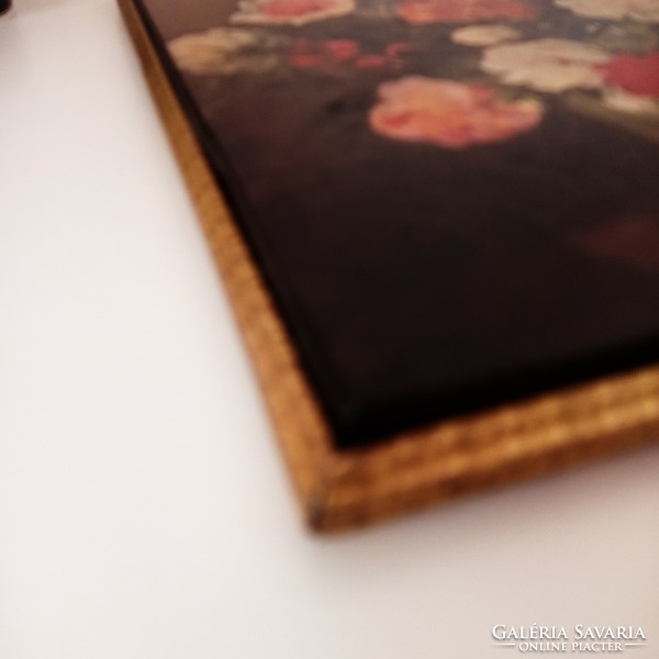 A high-quality print of a floral still life, framed