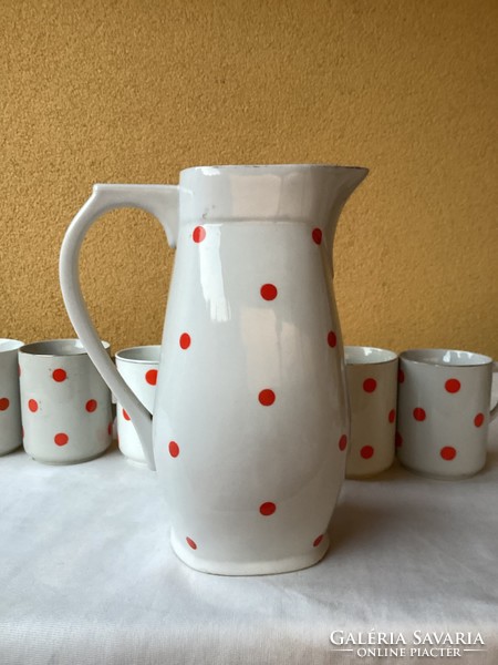 Zsolnay red polka dot jug with six mugs.