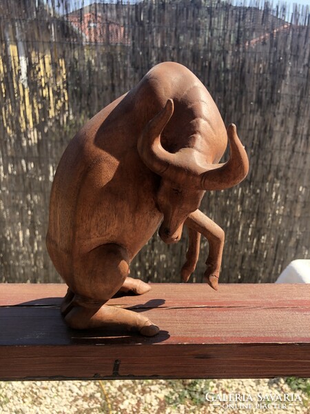 Wood carved bison