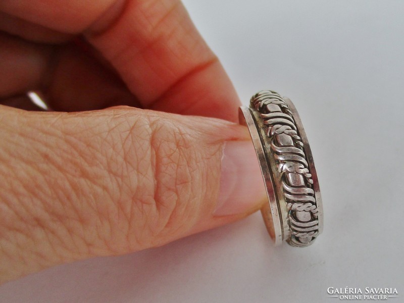 Silver hoop ring with a special pattern, with a rotating inner part