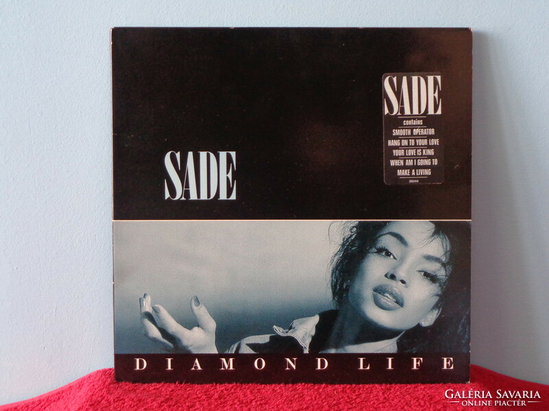 Sade első lemeze EX/EX állapotba eladó.