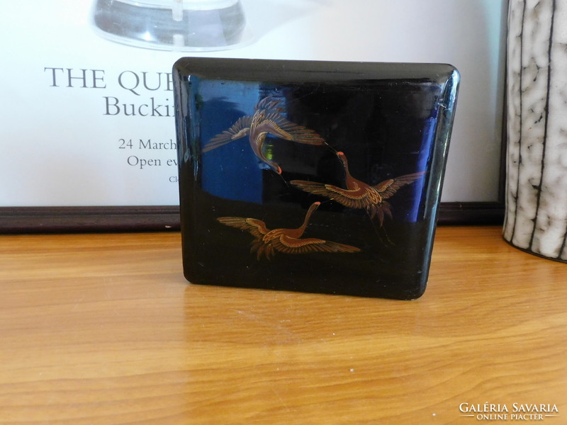 Old oriental lacquer box with cranes