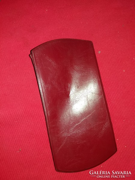 Antique burgundy soft faux leather glasses case with folk motif pattern as shown in the pictures