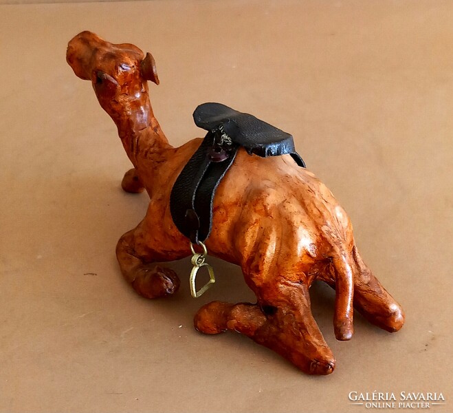 Leather hunchback ornament negotiable art deco design