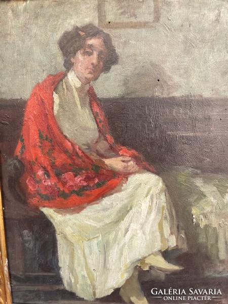 Portrait of a woman sitting on a sofa