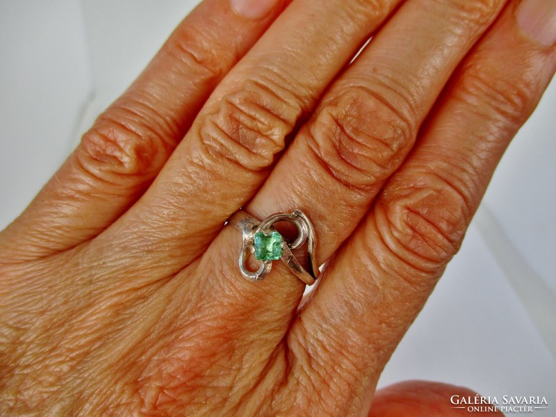 A special silver ring with a beautiful genuine emerald stone