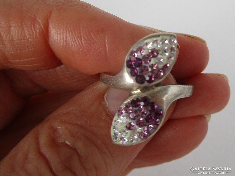 A very nice large silver ring with purple stones