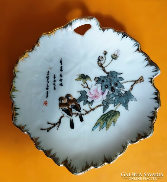 Hand-painted Japanese porcelain bowl with gilded edges