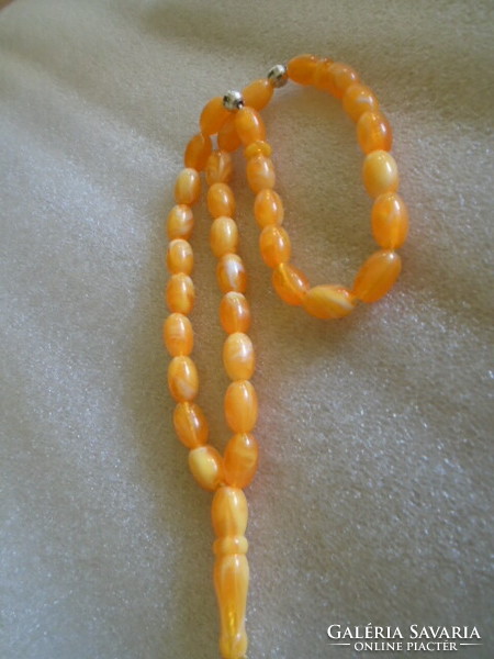 Old Buddhist mala prayer chain amber or vinyl?