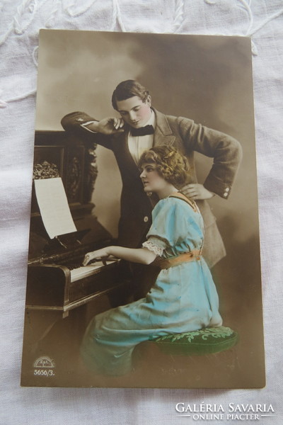 Antique German hand-colored romantic photo card/postcard lady/gentleman/piano 1913