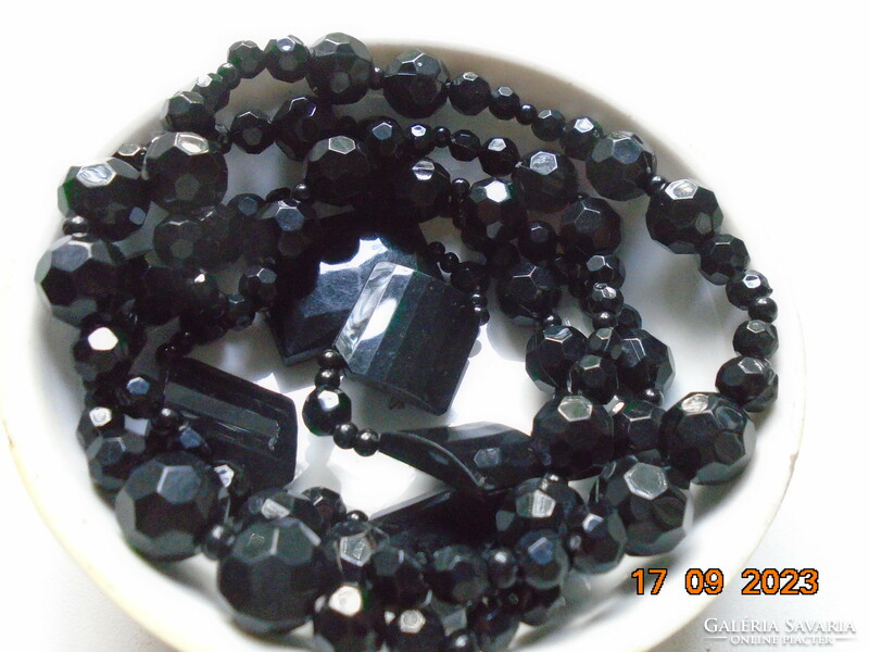 Spectacular necklace made of faceted black pearls with 4+1 faceted black pendants