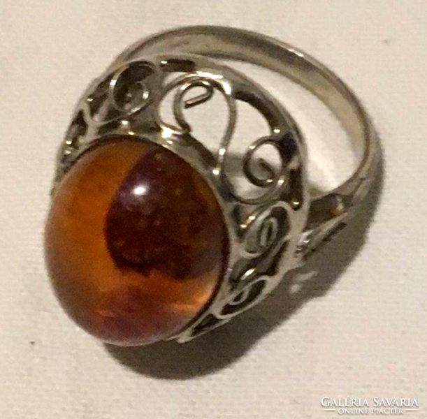 Ring with amber decoration