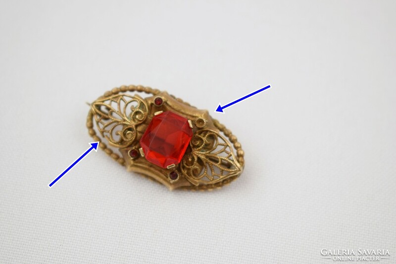Old copper brooch pin / with red frosted glass