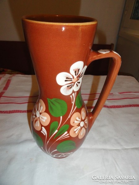 Ceramic jug with flower pattern