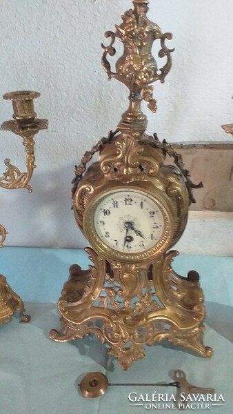 French baroque style bronze mantel clock with two candle holders for sale